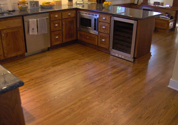 Kitchen with open shelves by Maurer Construction, San Diego