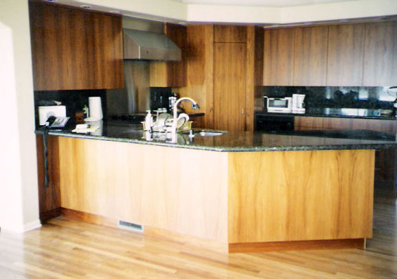 Remodeled kitchen with new flooring by Maurer Construction, San Diego