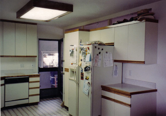 Renovated kitchen with new cabinets by Maurer Construction
