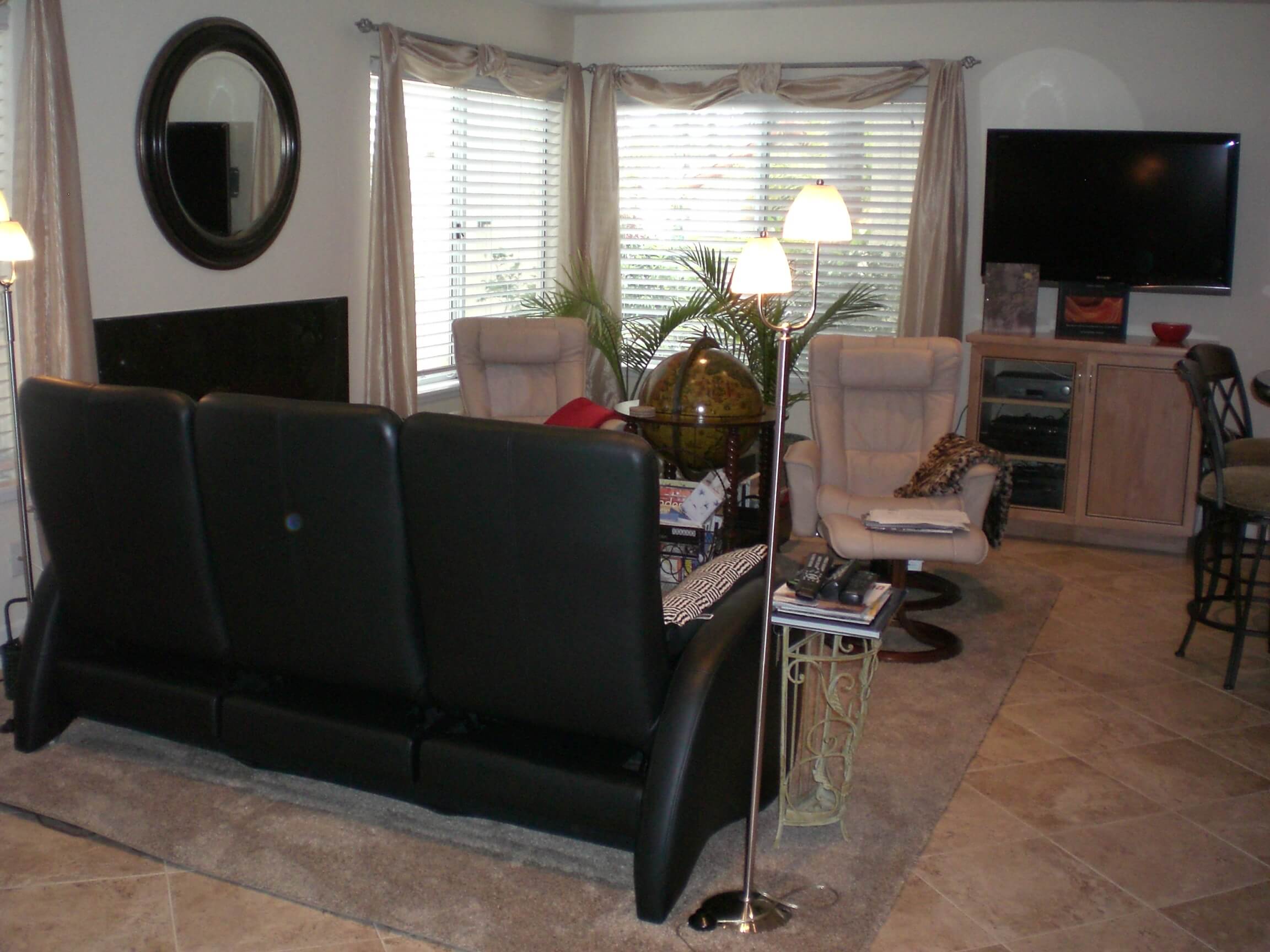 Renovated living room with built-in shelves by Maurer Construction
