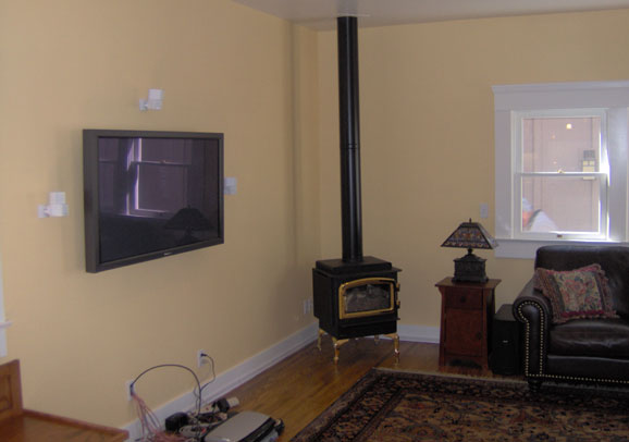 Stylish living room with new lighting by Maurer Construction, San Diego
