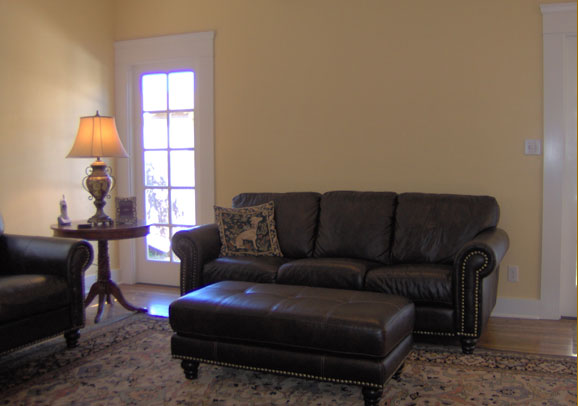 Updated living room with new furniture by Maurer Construction